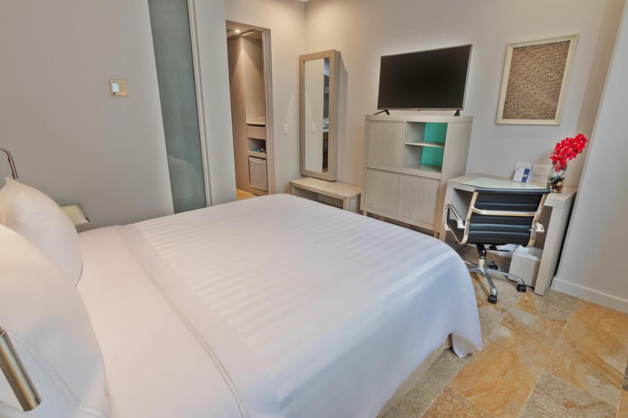 Ghl Hotel Montería Dış mekan fotoğraf A bedroom