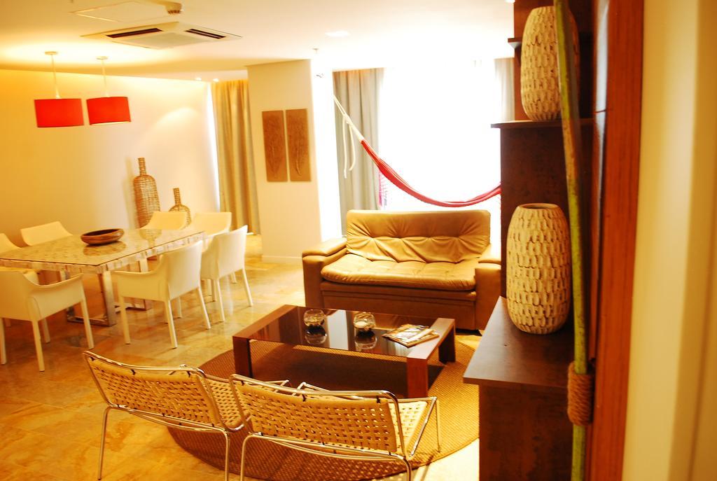 Ghl Hotel Montería Oda fotoğraf A living room in a typical apartment
