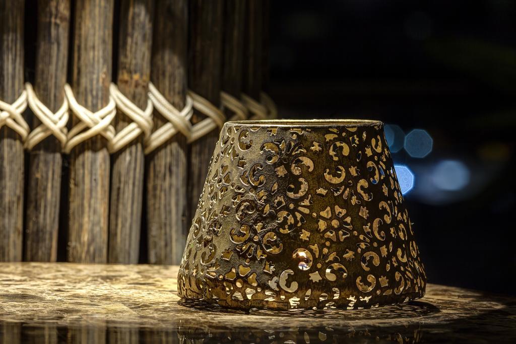 Ghl Hotel Montería Dış mekan fotoğraf A candle holder